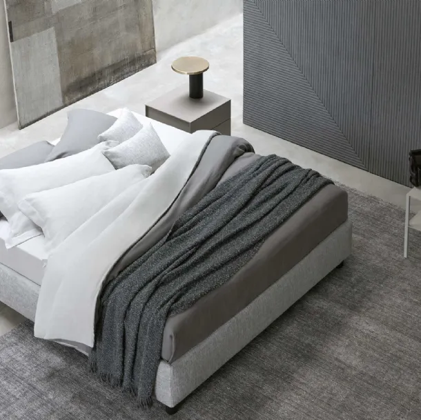 Letto in tessuto Sommier semplice e versatile con contenitore di Flou